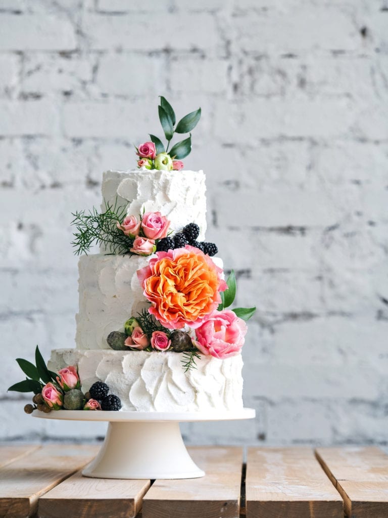 White Wedding Cake With Greenery Roses Flowers